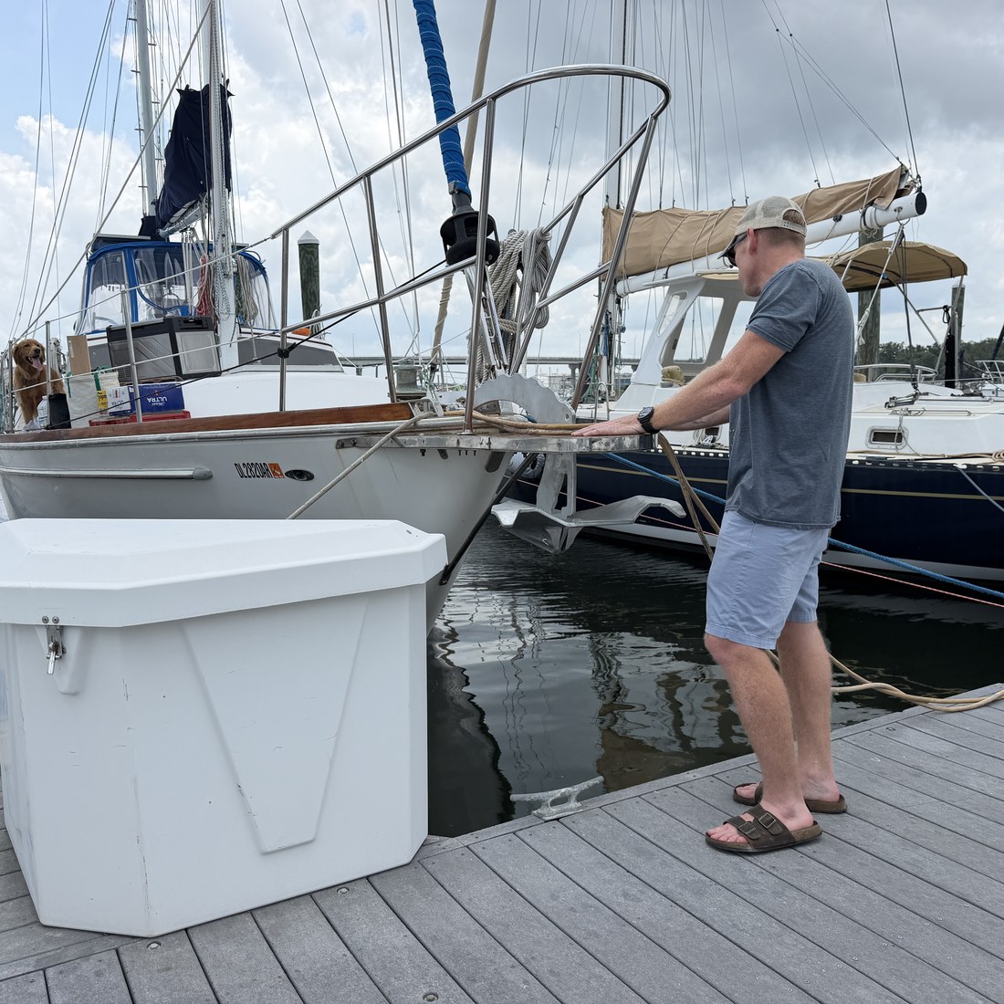 Dock day with a cooler and gear laid out