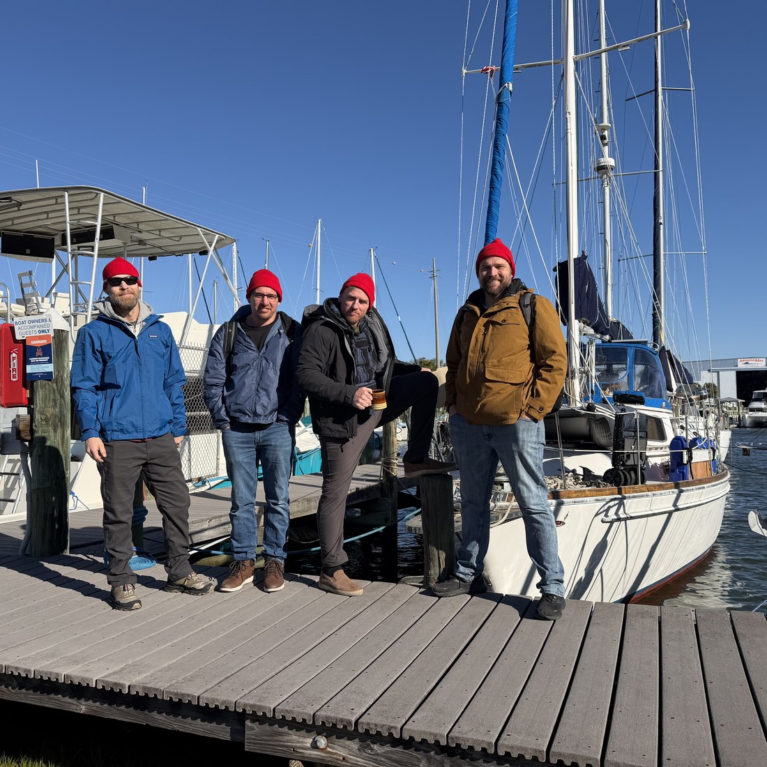 Jason with friends on the dock next to Koyukon