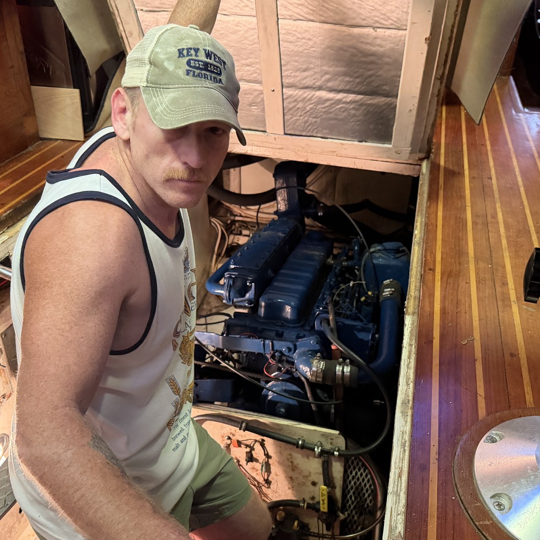 Jason checking the engine below deck